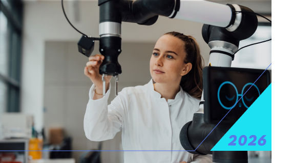 Scientist operating robotic arm in lab